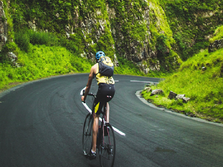 A man riding an electric assist e-bike