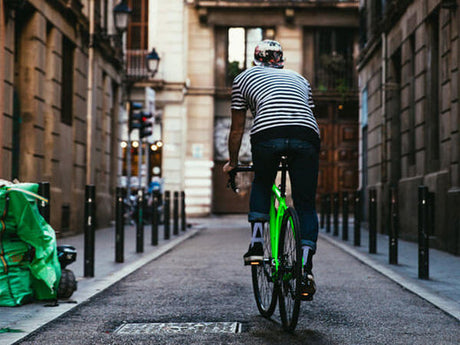 a person cycling on the street