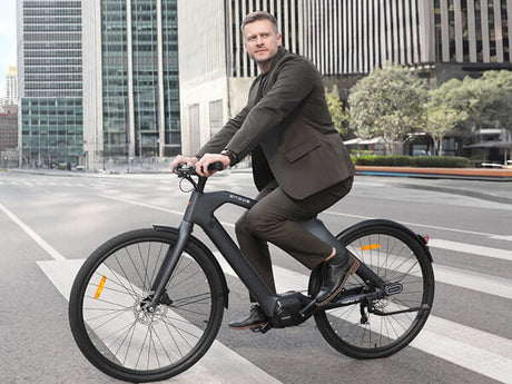 a man riding an engwe mapfour n1 pro city ebike