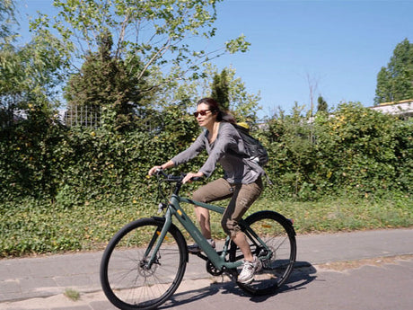 a person test riding an engwe mapfour n1 pro urban e-bike