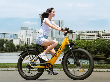 a girl riding on urban e bike engwe e26