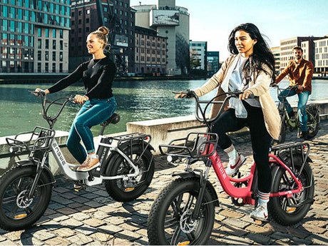 people riding engwe l20 electric fat bikes on the road