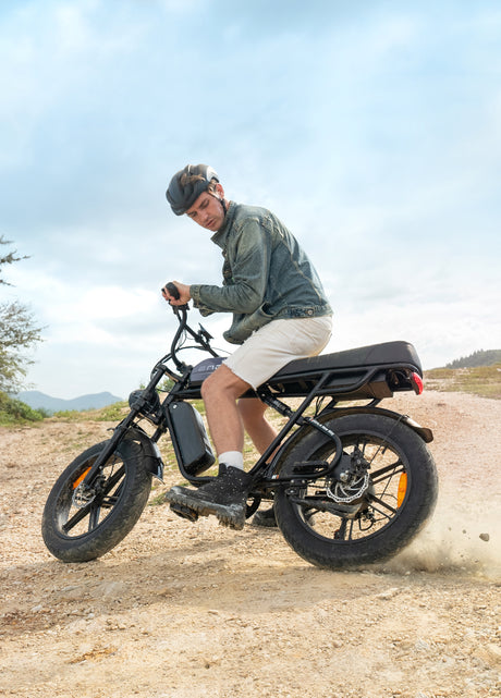 a man rides on fat tire e bike engwe m1